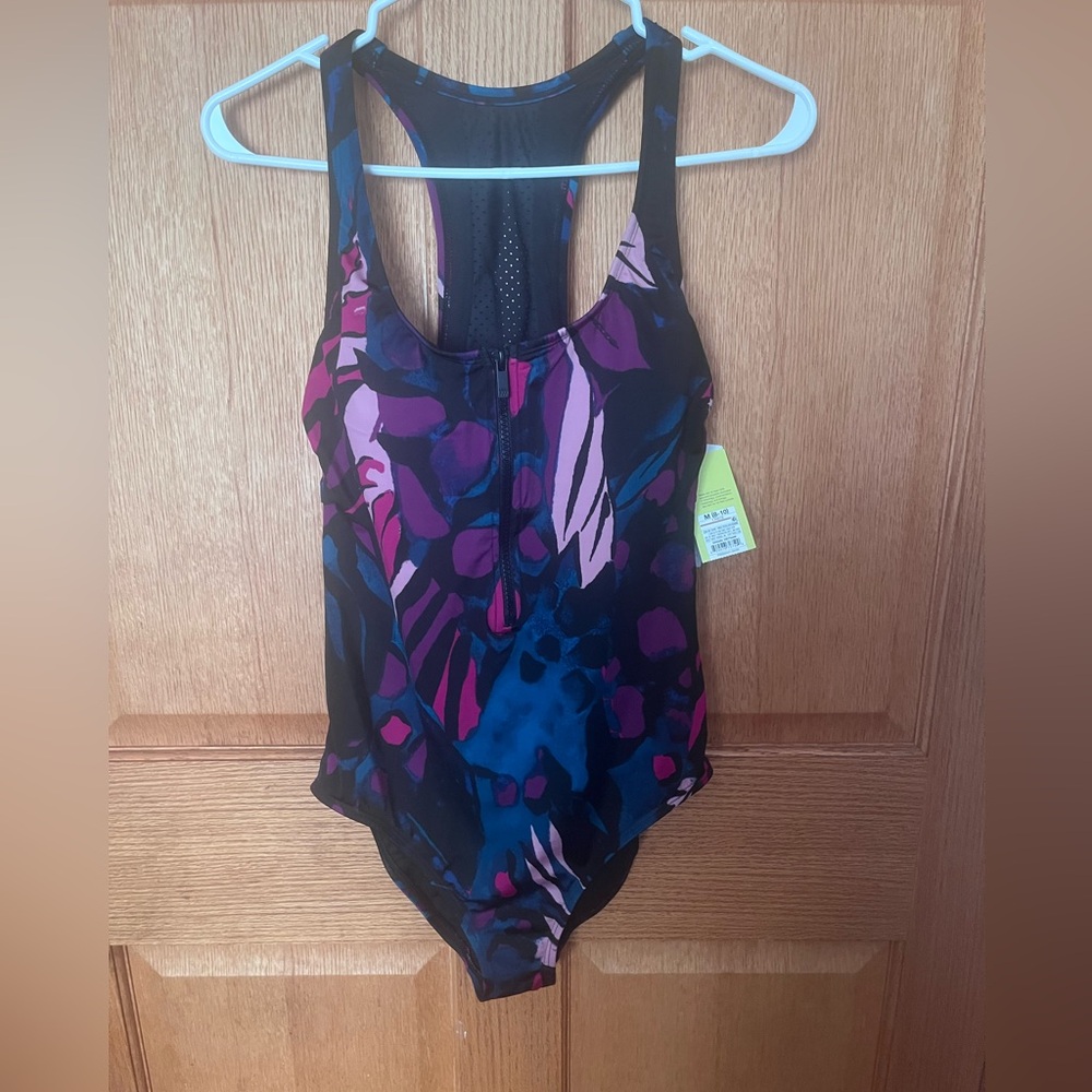 All in motion purple & black one piece Swimwear
Size medium